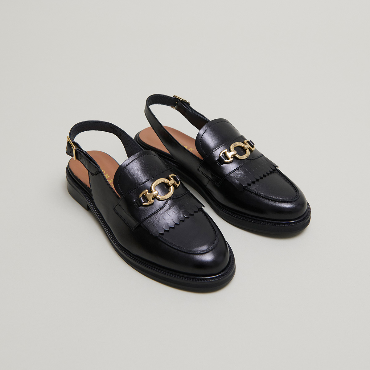 Mocassins à bouts arrières ouverts