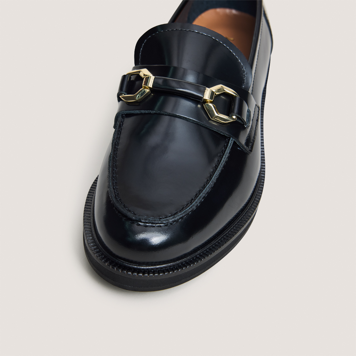 Mocassins à mors dorés