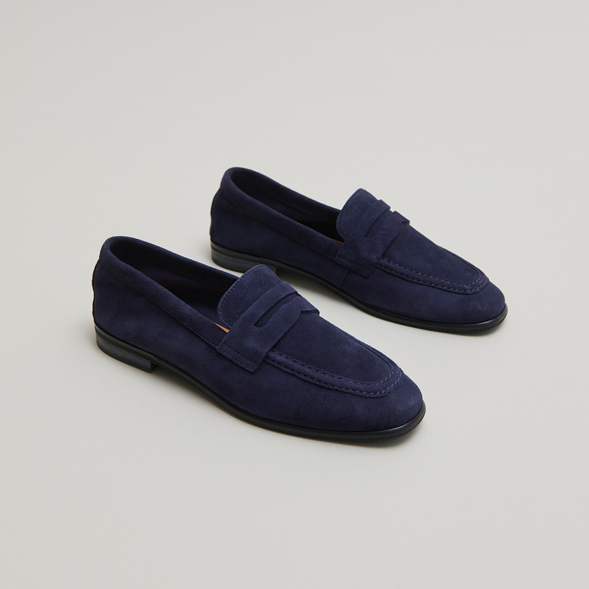 Mocassins à talons plats et bouts arrond...